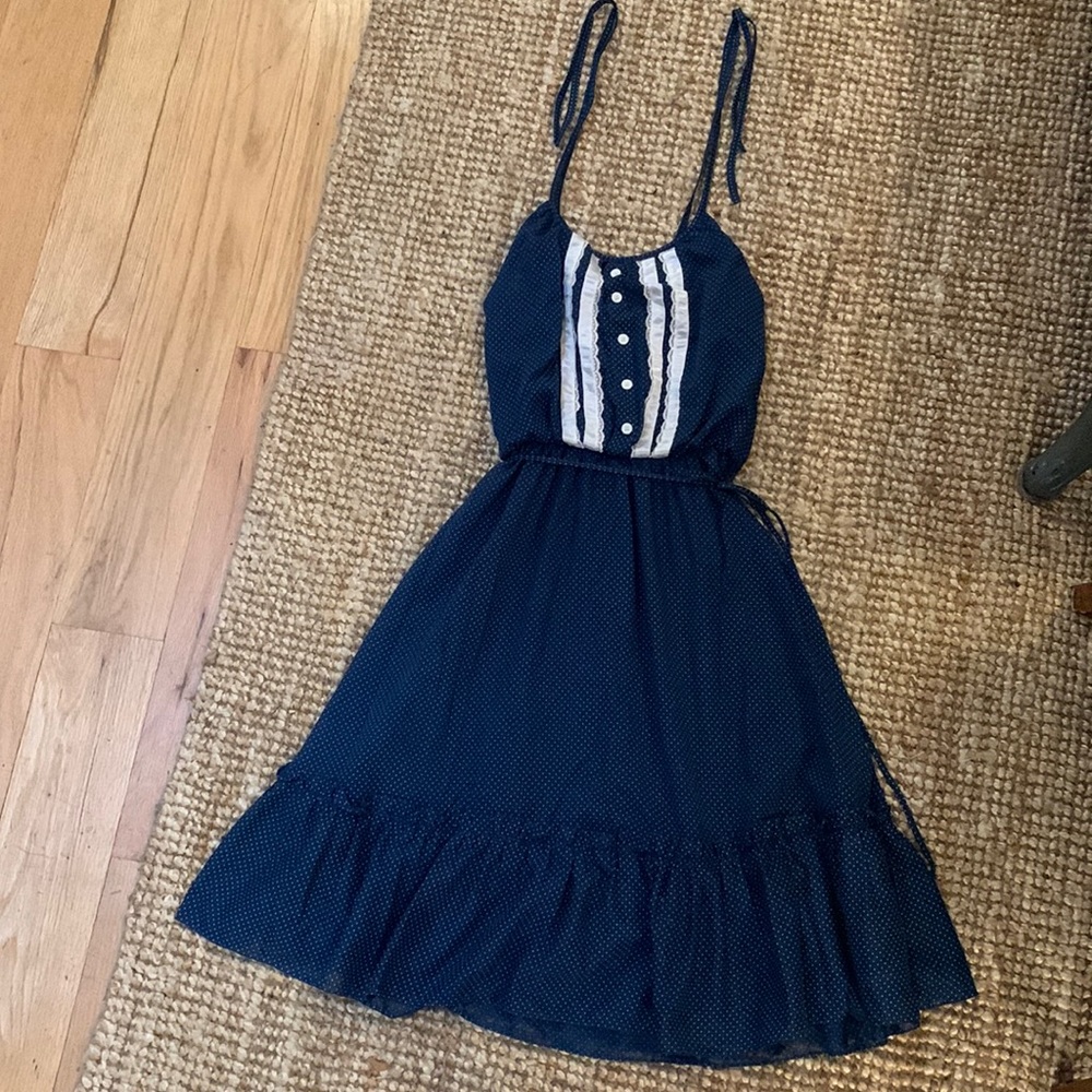 Vintage polka dot dress. Size small. Adjustable shoulder strap ties.